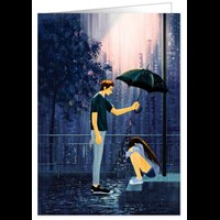 Man holding umbrella over woman