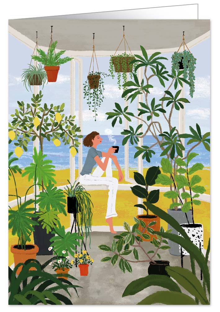 Woman relaxing surrounded by plants